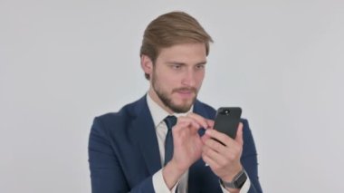 Young Adult Businessman Loss on Smartphone on White Background 