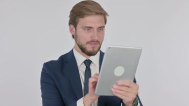 Young Adult Businessman Reacting to Loss on Tablet on White Background 