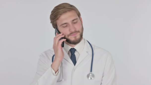 Young Adult Doctor Talking Phone White Background — Wideo stockowe