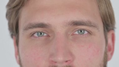 Face of Serious Young Adult Man on White Background 