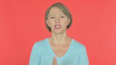 Senior Old Woman having Toothache on Red Background