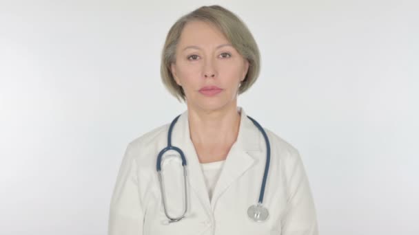 Serious Senior Female Doctor White Background — Stok video