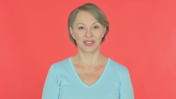 Senior Old Woman Waving Hand Say Hello Red Background — Video
