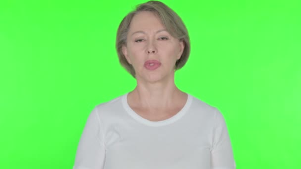 Tired Senior Old Woman Yawning Green Background — Stock Video