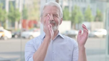 Senior Old Man Clapping in Appreciation Outdoor
