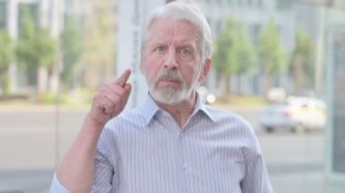 Portrait of Angry Senior Old Man Fighting Outdoor