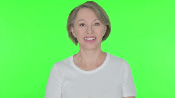 Senior Old Woman Talking Video Call Green Background — Stock Video
