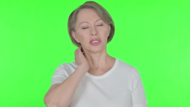 Senior Old Woman Neck Pain Green Background — Video