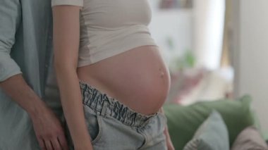 Husband Stokes Pregnant Young Woman Big Belly, Close Up