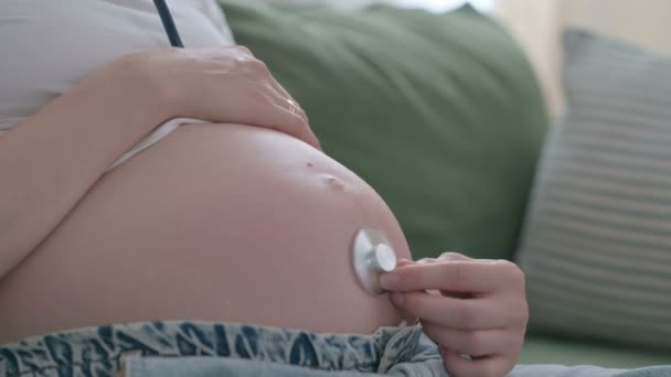 Close Pregnant Young Woman Listening Her Big Tummy Stethoscope — Stockvideo