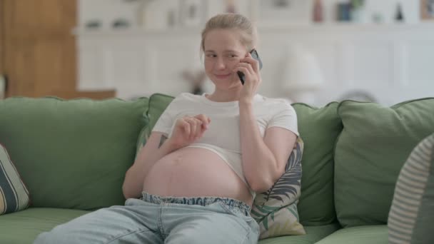 Happy Pregnant Young Woman Talking Phone Home — Video Stock