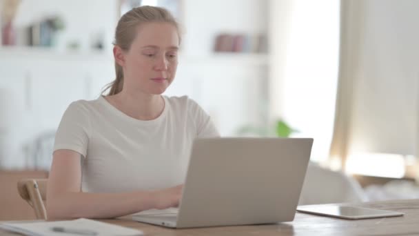 Young Woman Pointing Camera While Using Laptop Office — Video