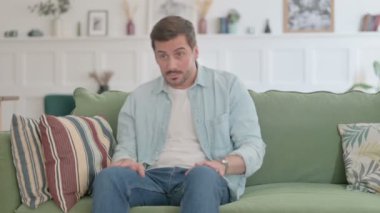 Casual Man Standing Up Going Away, Leaving Sofa 
