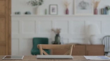 Casual Man Coming, Sitting and Opening Laptop for Work