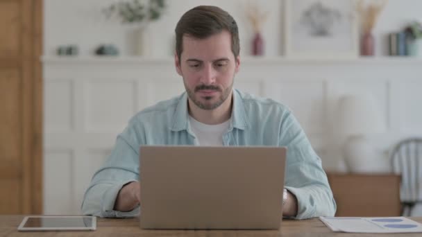 Casual Man Having Wrist Pain While Using Laptop — Stock video