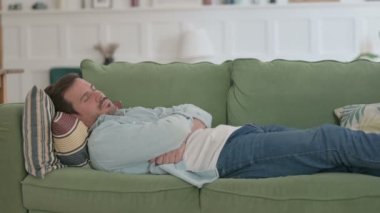 Relaxed Casual Man Sleeping in Bed Peacefully 