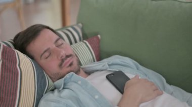 Relaxed Casual Man Sleeping in Bed Peacefully 