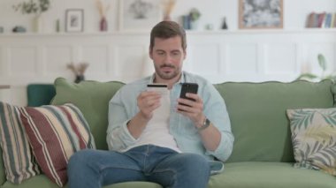 Casual Man Unsuccessful Online Payment on Smartphone