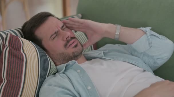 Casual Man Has Headache While Sleeping Bed — стоковое видео