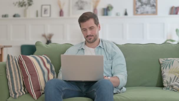 Casual Man Laptop Having Neck Pain Sofa — Video