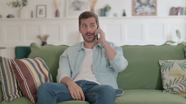 Casual Man Talking Phone Sofa — Stock videók