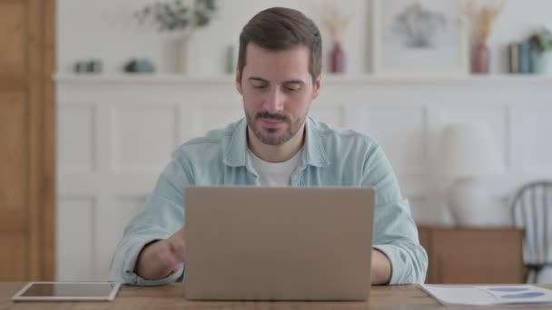 Casual Man Showing Thumbs While Using Laptop — Stockvideo