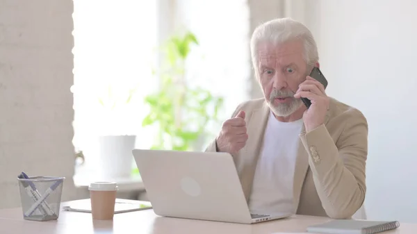 Angry Senior Old Man Talking on Phone