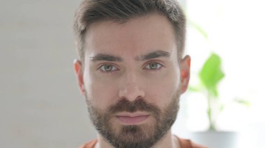 Face of Creative Young Man Looking at the Camera