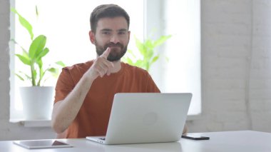 Creative Young Man Pointing at the Camera and Inviting