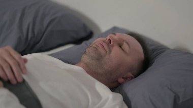 Close up Middle Aged Man Feeling Uncomfortable while Sleeping in Bed