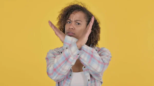 African Woman Showing Sign Arm Gesture Yellow Background — Zdjęcie stockowe