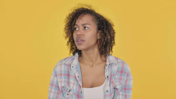 African Woman Feeling Scared Frightened Yellow Background — Zdjęcie stockowe