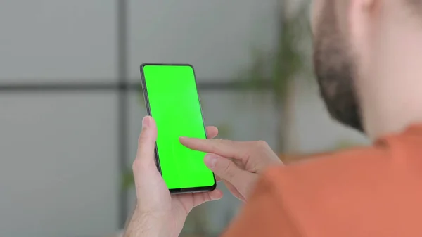 Creative Young Man Using Smartphone Green Chroma Key Screen — Stok fotoğraf