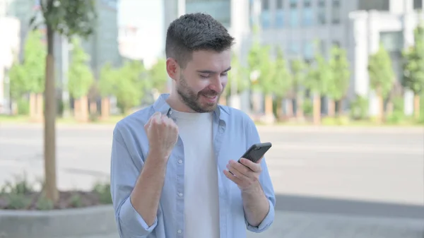 Man Celebrating Online Success Smartphone Outdoor — 图库照片