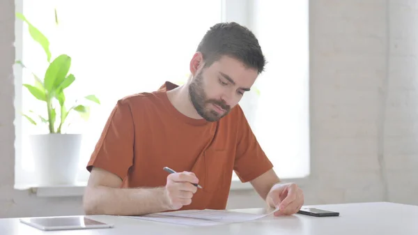 Creative Young Man Working Documents Office Stock Picture