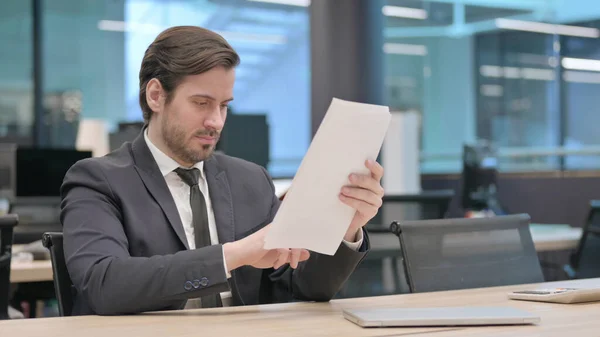 Young Businessman Reading Documents Office Paperwork —  Fotos de Stock