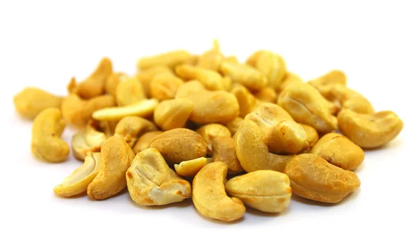 Tasty cashew nuts on white — Stock Photo, Image