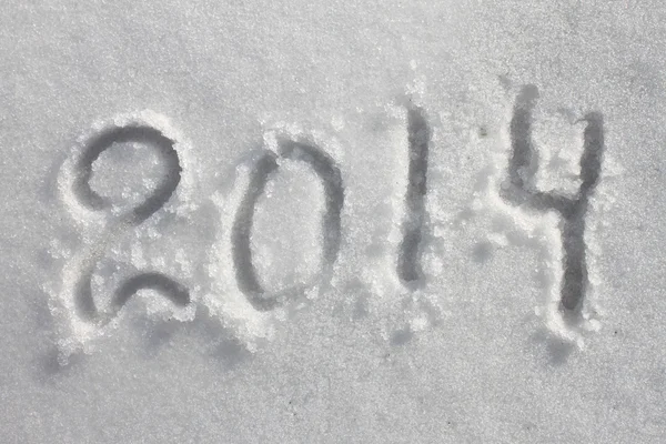 Ano 2014 escrito na neve — Fotografia de Stock