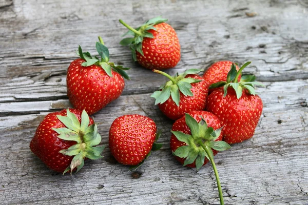 Fresh strawberries on wooden background — Stock Photo, Image