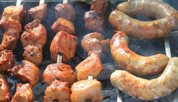 Grilling bratwursts — Stock Photo, Image