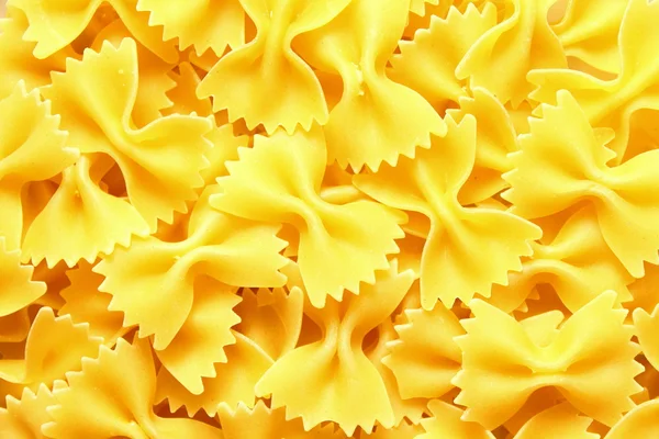 Italian Farfalle Pasta raw food background — Stock Photo, Image