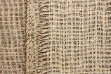 Kahverengi kumaş desenli kahverengi çuval bezi. Eskimiş çuval bezi deseni, çuval bezi deseni ve güzel çuval bezi rengi.