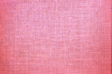 Kırmızı çuval bezi, güzel bez kumaş dokusu ve güzel çuval bezi rengi ve güzel çuval bezi rengi arkaplan olarak güzel kırmızı kumaş bezi dokusu ile retro tarzı.