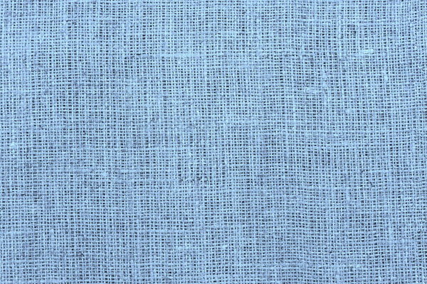 Голубой мешок с красивой текстурой холста из голубой ткани в стиле ретро с красивой синей текстурой холста ткани, как винтажный фон мешковины с текстурой мешковина и красивым цветом мешковины