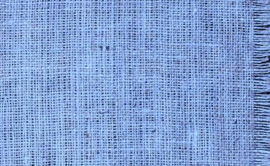Güzel mavi kumaş dokusuna sahip mavi çuval bezi. Güzel mavi kumaş bezi dokusu, çuval bezi deseni ve güzel çuval bezi rengi arkaplan.