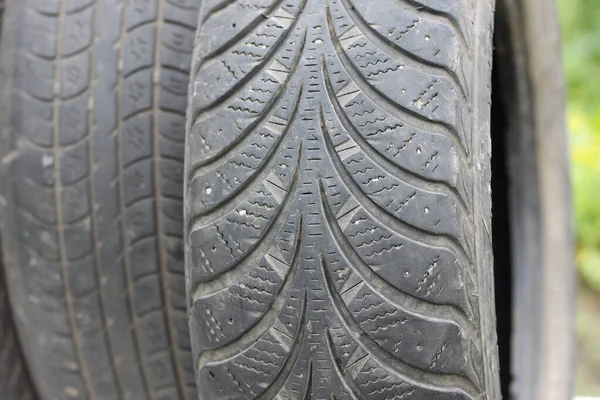 Old Winter Summer Tires Varying Degrees Wear — Zdjęcie stockowe