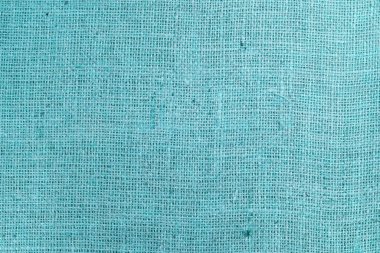 Güzel mavi kumaş dokusuna sahip mavi çuval bezi. Güzel mavi kumaş bezi dokusu, çuval bezi deseni ve güzel çuval bezi rengi arkaplan.