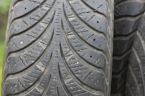 Old Winter Tires Varying Degrees Wear — Zdjęcie stockowe