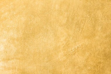 Beautiful yellow background with leather texture with yellow veins of yellow leather as sample of yellow background from natural leather or sample of texture of leather for beautiful yellow background