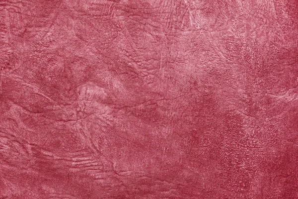 Beautiful red background with leather texture with red veins of red leather background as sample of red background from natural leather or sample of texture of leather for beautiful natural background